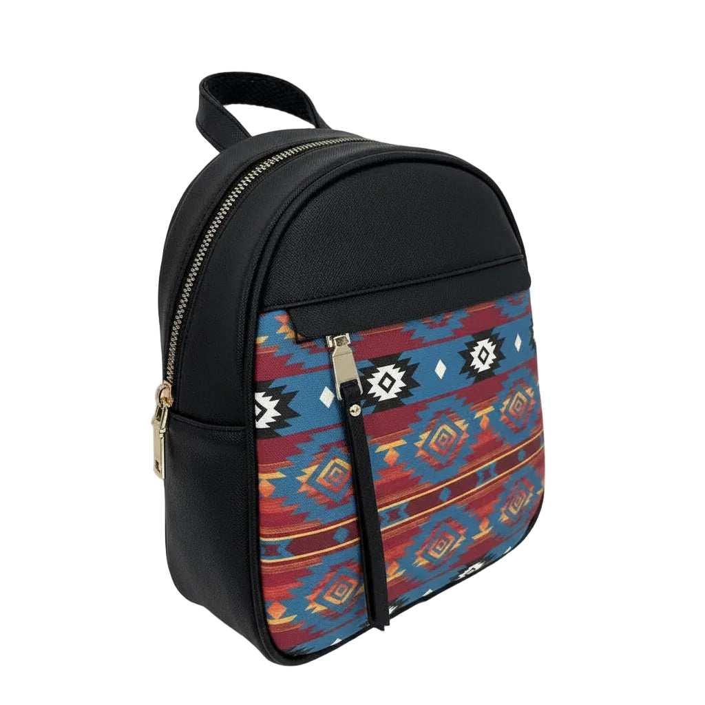 A small zippered backpack with a black faux-leather body and a colorful Southwestern patterned front pocket featuring red, blue, yellow, and white geometric designs.