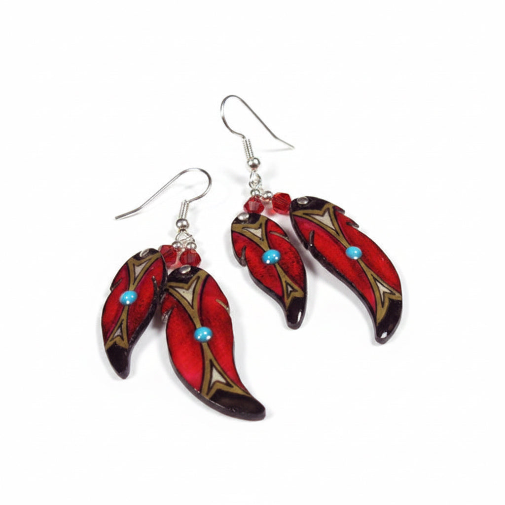 A pair of red double soaring feather earrings made from moose antler, featuring blue beads and silver hooks.