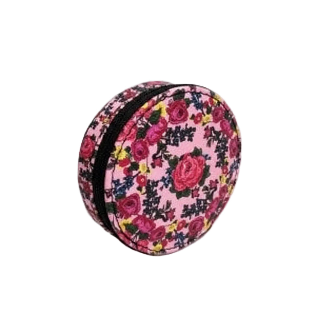 Round floral-patterned case with a black zipper on a light gray background