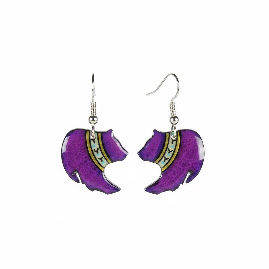 A pair of purple grizzley bear earrings made from moose antler, with black and white details on a display card.